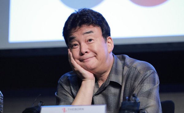 요식업계 대부 백종원 더본코리아 대표가 코스피 입성 꿈을 이뤘다. 사진은 기자간담회에서 질문을 듣고있는 백대표. 사진=공동취재