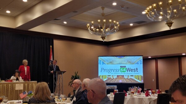 On the left President Debbie Shaw-Franke at Progress 64 West, on the right Lt. Govenor  Hon. David Wasinger